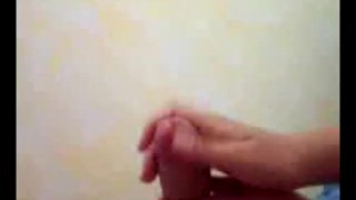 she jerks him and gets cum all over her hands