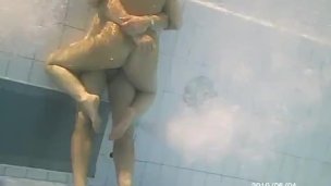 couples amateur sex fun into public pool