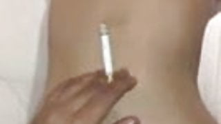 china – guy is having a smoke while fucking a slut