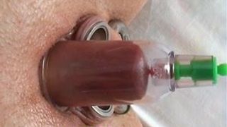 pumping clitoris tied bondage pumped to piercing nipples