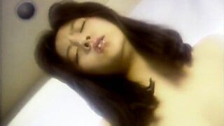 wet japanese babe fingers her solo pussy