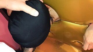 training a sex slave who is restrained by a guillotine and cannot move, and suffers from irama with an open mask