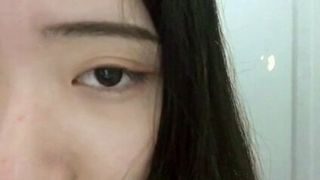 asian (20yo) bites lip and rubs swollen clit in the shower